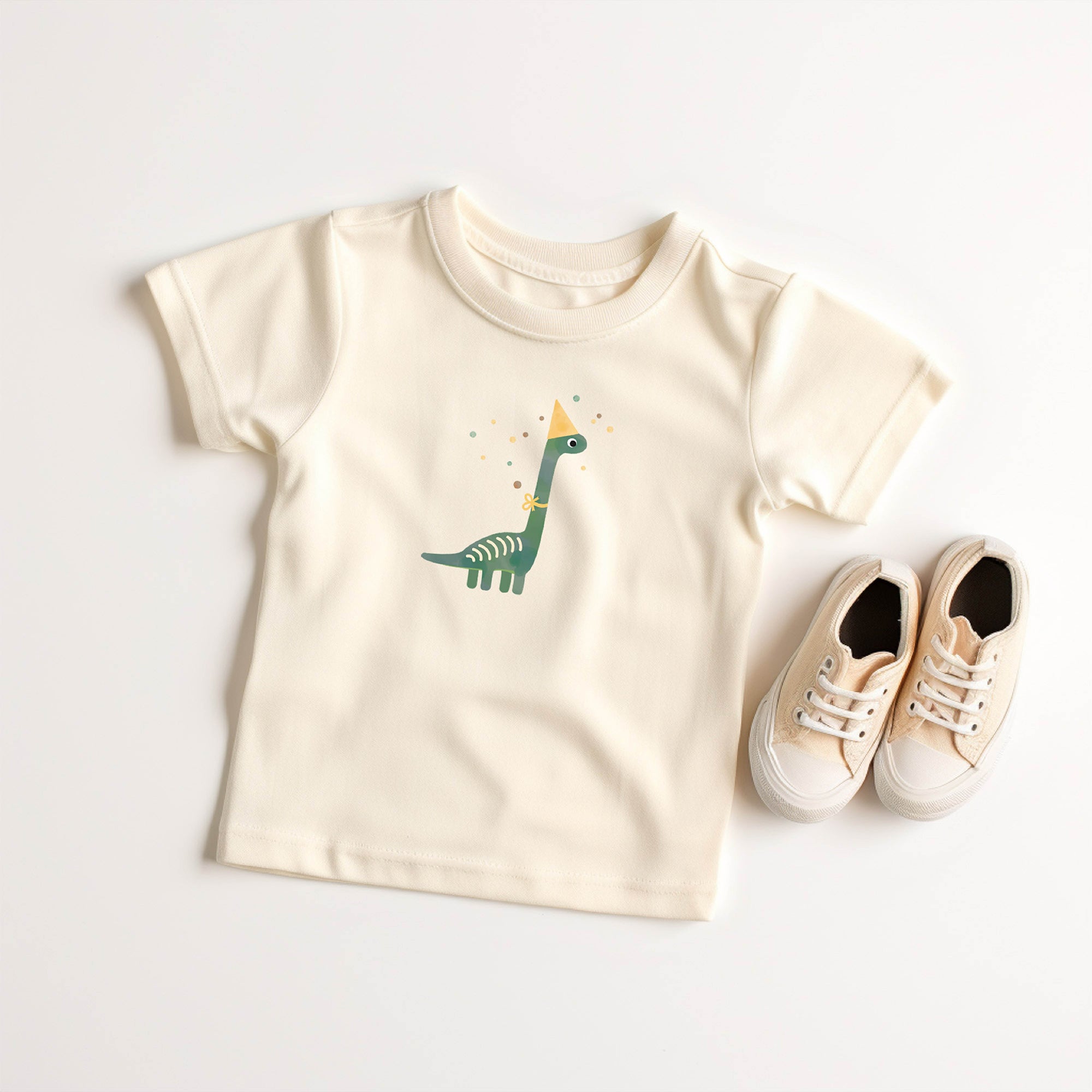 Bügelbild mit Dino und Partyhut im fröhlichen Design, perfekt zum Aufbügeln auf Kinderkleidung und Accessoires.