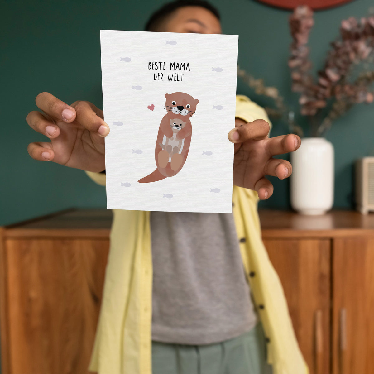 Postkarte mit zwei Ottern und dem Schriftzug „Beste Mama der Welt“ im niedlichen Design, ideal als Muttertagskarte oder liebevollen Gruß.