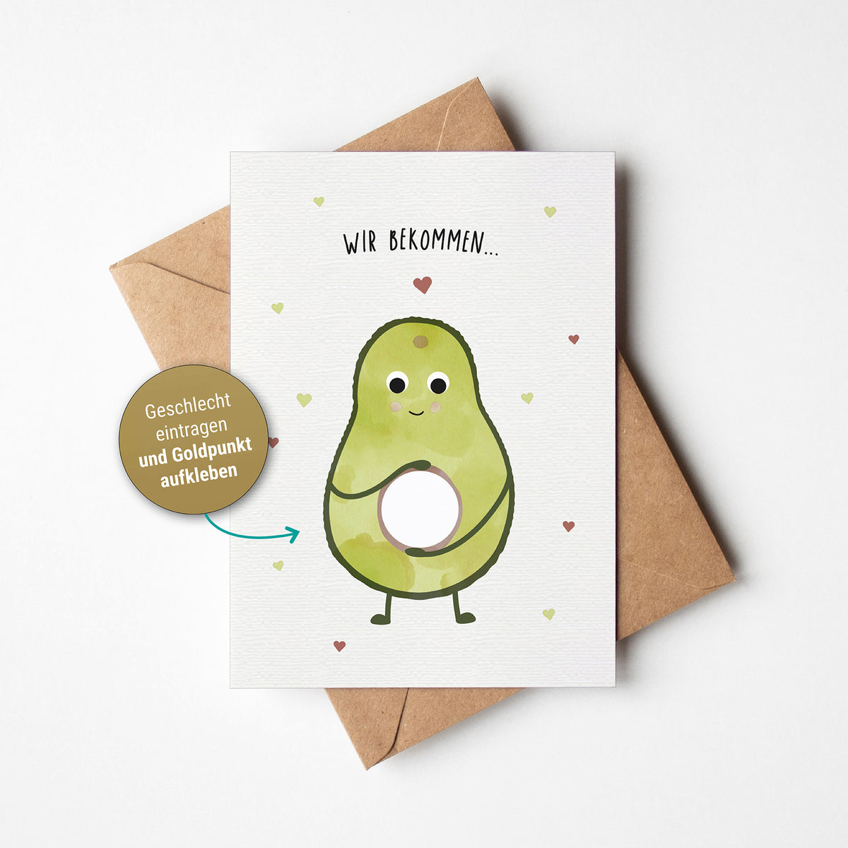 Illustration einer Rubbelkarte mit einer Avocado, die das Babygeschlecht verkündet, und dem Text „Es wird ein ...“ auf hellem Hintergrund