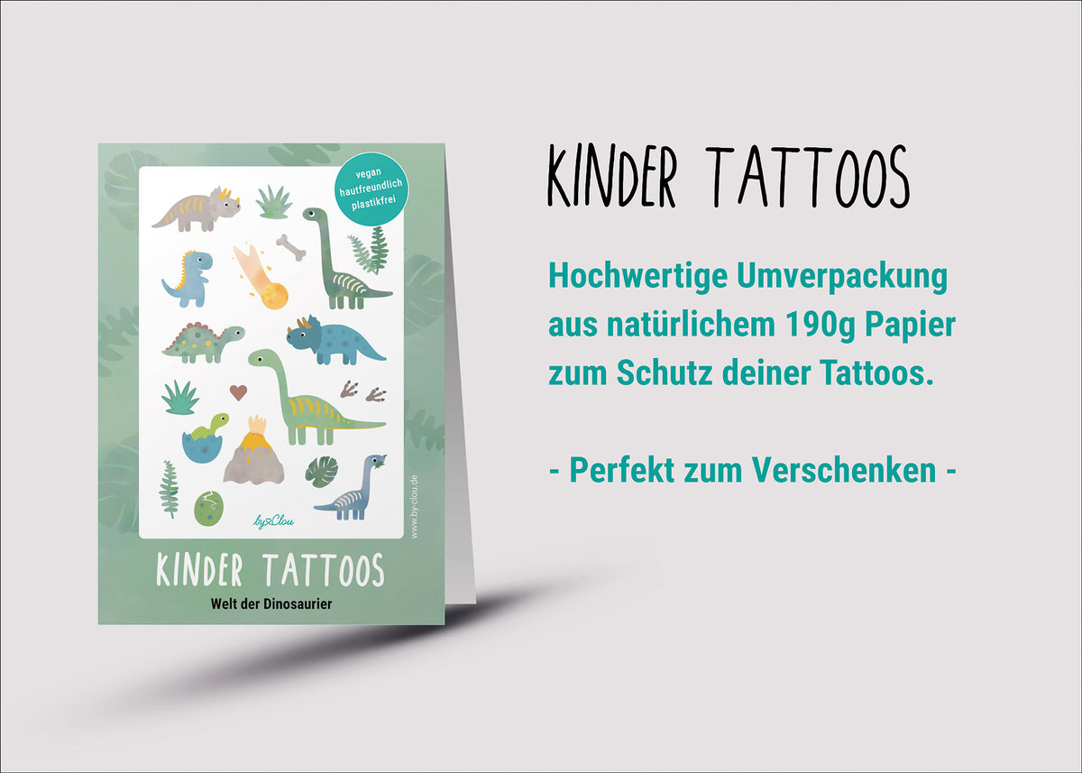 Bogen mit temporären Kindertattoos im Dinosaurier-Design – mit fröhlich illustrierten Dinos wie T-Rex, Triceratops und Stegosaurus. Ein Dino-Spaß für kleine Entdecker:innen