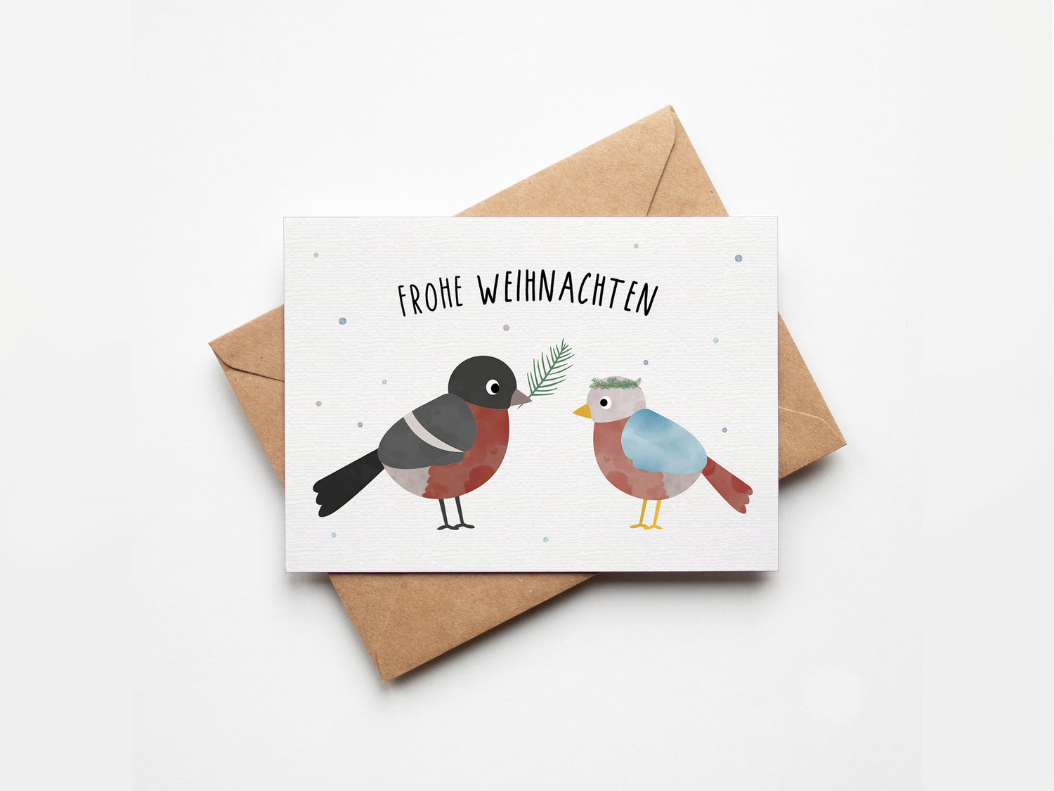 Postkarte mit Wintervogel auf einem Zweig und dem Schriftzug „Frohe Weihnachten“ im zarten Design, ideal als Weihnachtskarte oder kleiner Gruß.